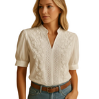 woman wearing classic white button blouse with lightly tailored fit shown in full front view outfit