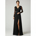 Woman wearing a black lace evening gown in an indoor setting.