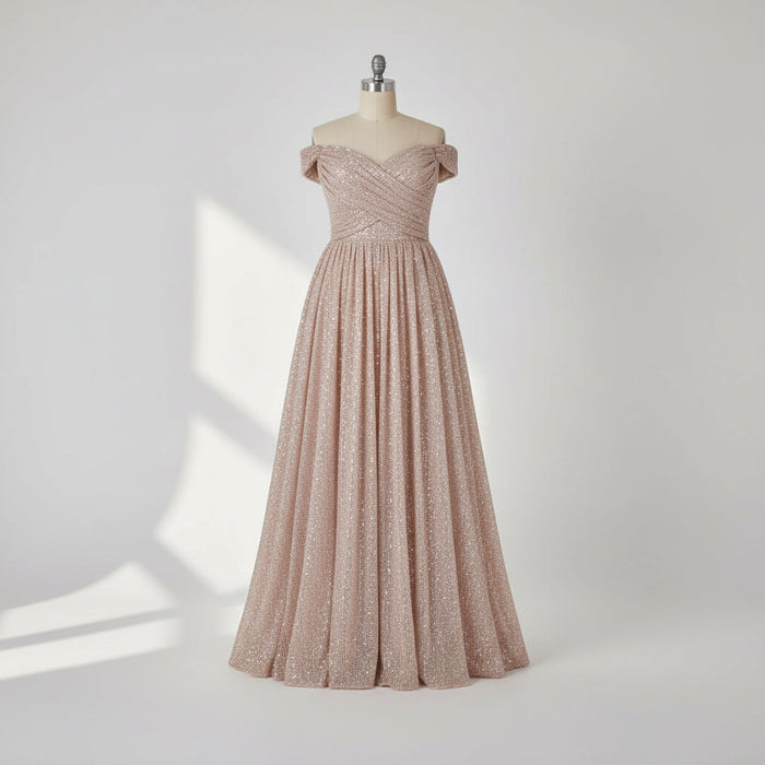 Elegant off-shoulder gown with a high slit on a gray background