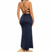 Navy blue dress with criss-cross back design on a beige background
