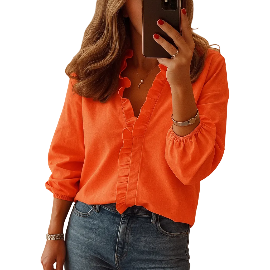 woman wearing ruffle detail blouse with lightweight structure shown in full front view outfit