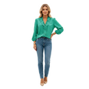 back view of ruffle detail blouse showing clean structure and relaxed fit