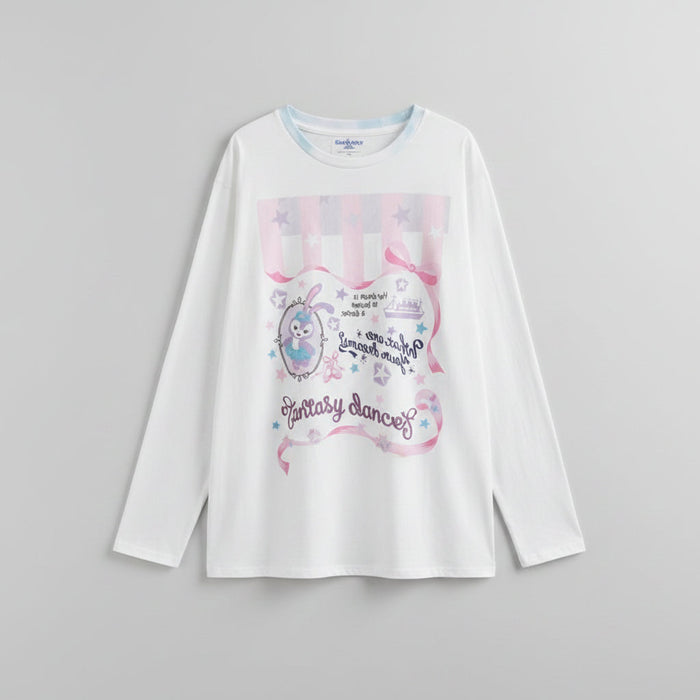 White shirt with pink graphics and text worn by a person, against a neutral background